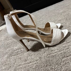 Well used white heels. Need some love, they have some scuffs and a little wear.